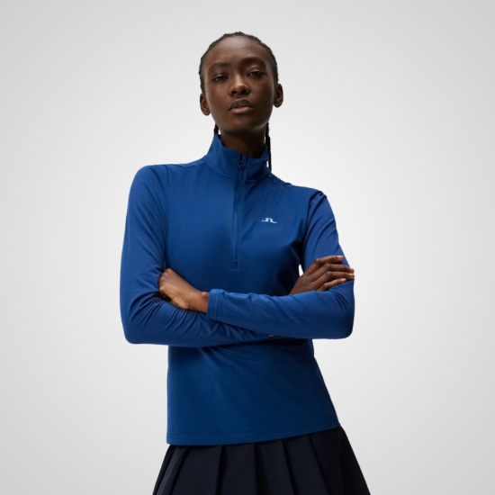 Model wearing J.Lindeberg Ladies Lauryn 1/2 Zip Blue Golf Midlayer Front View