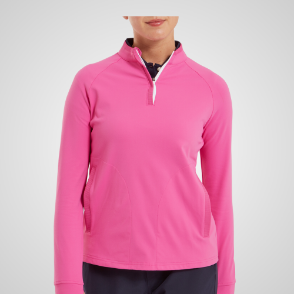 Model wearing FootJoy Ladies Jersey Pink Golf Mid Layer Front View