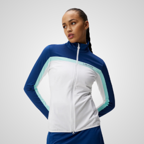 Model wearing J.Lindeberg Ladies Janice White Golf Midlayer Front View