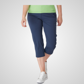 Model wearing Swing Out Sister Ladies Core Navy Golf Capri Trousers Front View