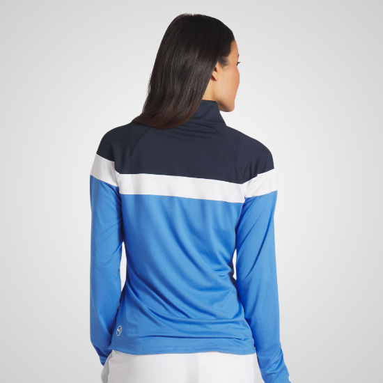 Model wearing Puma Ladies Lightweight 1/4 Zip Navy Golf Midlayer Back View