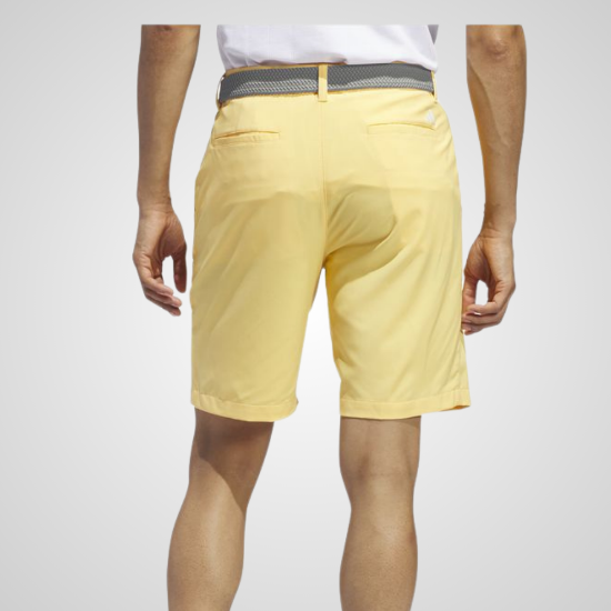 Model wearing adidas Men's Ultimate 365 Semi Spark Yellow Golf Shorts Back View
