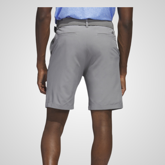 Model wearing adidas Men's Ultimate 365 Grey Three Golf Shorts Back View