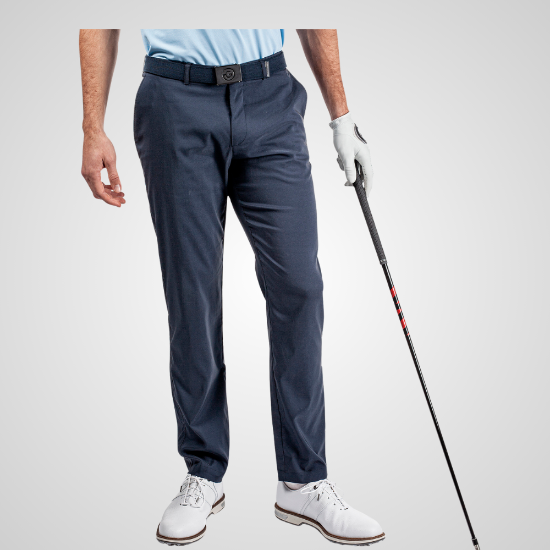 Model wearing Galvin Green Men's Noah Navy Golf Trousers Front View