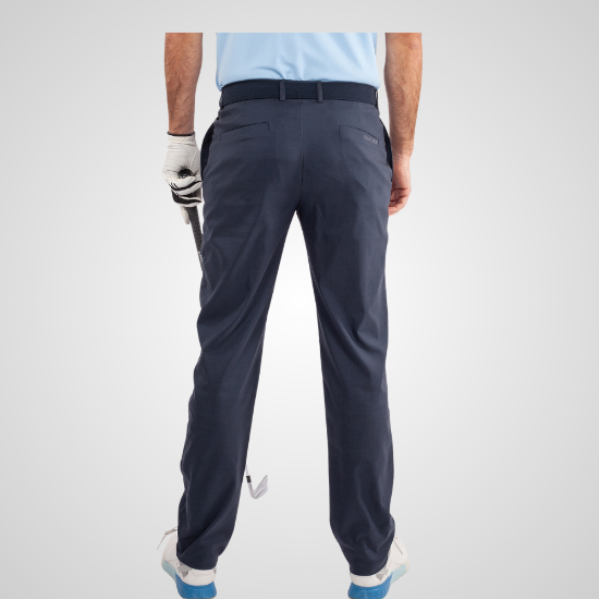 Model wearing Galvin Green Men's Noah Navy Golf Trousers Back View